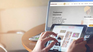 A tradesman searching for job opportunities online